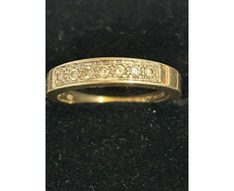 9ct gold ring set with 7 diamonds size O 3.1 grams 