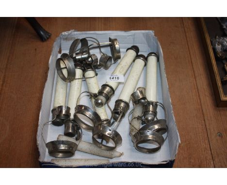 Six white metal unusual candle holders and a domed anniversary Clock, a/f