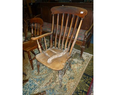 A Windsor Armchair with solid Elm seat, one arm requires re-attachment