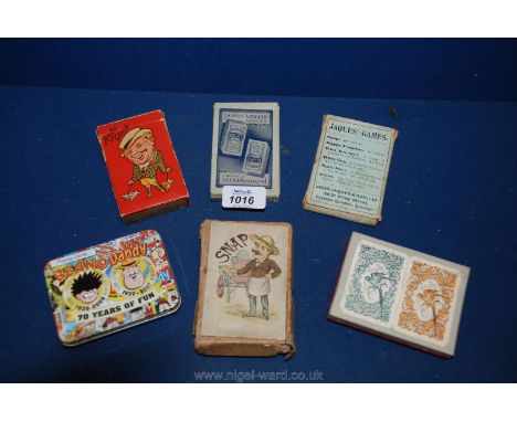 Six packs of vintage playing cards.