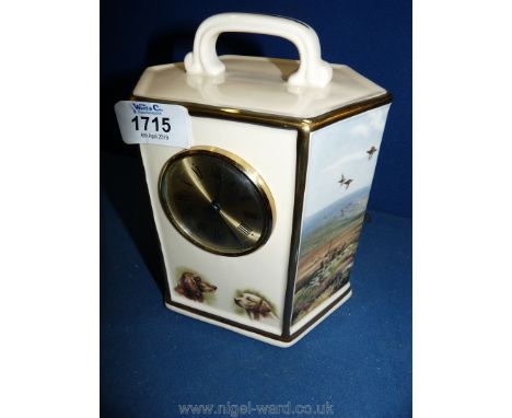 A china Quartz clock by Pointers of London &amp; Edinburgh depicting shooting and birds in flight.