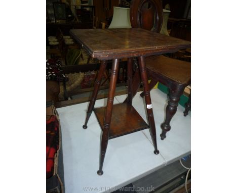 A Satinwood arts and crafts occasional Table having four turned legs united by a lower shelf, the top 15 1/2'' x 15 1/4'' squ