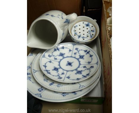 A small quantity of Royal Copenhagen china including milk jug with ribbed surface marked LWX 2241 to base, teacup and saucer,