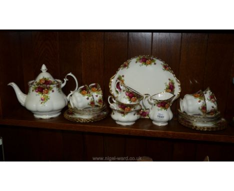 A Royal Albert 'Old Country Roses' Teaset consisting of six cups, six saucers and six tea plates, cake plate, milk jug, sugar