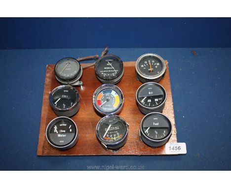 Nine British pre-war and post-war Gauges including oil pressure, water temperature, volts, etc. by Smiths and Lucas