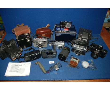 A quantity of cameras including Polaroid, Kodak box, Minolta etc.