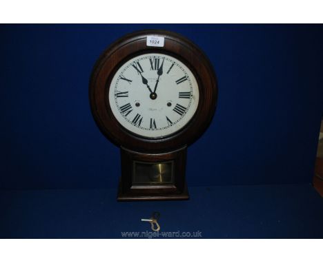 A President 30 day wall Clock with key.