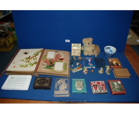 A box of miscellanea including teddy, cribbage cards and dice, domino's, old photo album, etc.