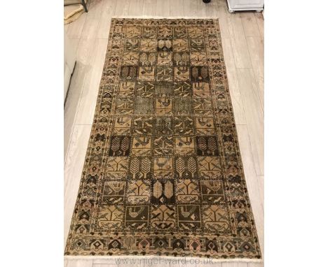 A hand-made Bakhtiar, ''55 houses'' Carpet in beige, 9'2" x 4'8"