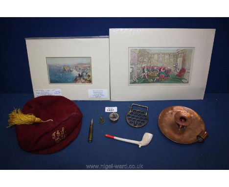 A box of miscellanea including print, brass bullet, Irish pipe, etc.