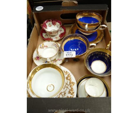 A small quantity of cabinet Cups and saucers including Sutherland, Portugal and embossed gold decoration with crossed swords 