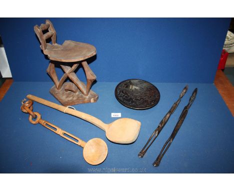 A small chair made from one piece of wood, miscellaneous treen including spoon, ladle, etc.