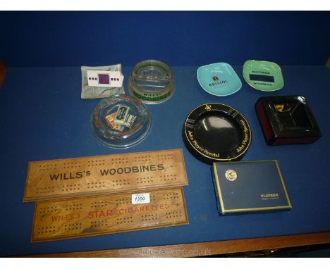 A box of Advertising items including ashtrays and Cribbage boards.