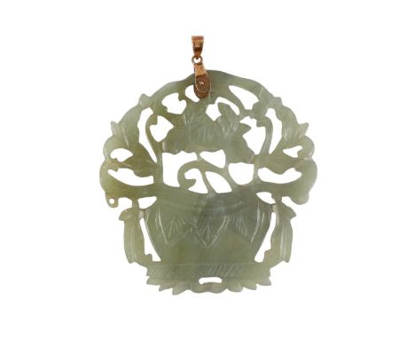 A Chinese pierced jade / hardstone pendant with 14ct gold suspension loop stamped 14K, 6cms high.