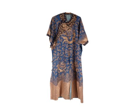 A Chinese blue silk gold thread embroidered dragon robe with five clawed dragons amongst clouds, with pale blue lining and gi