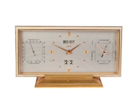 A 1960's gilt brass Ergas desk top clock barometer thermometer, 26cms wide.Condition ReportThere is wear to the gilding, the 