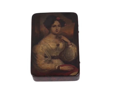 A Stobwasser painted papier-mâché snuff box, the lid decorated with a portrait of Empress Amelie of Brazil, with deep red int