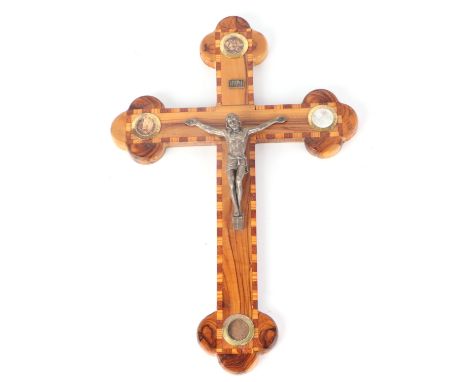 An inlaid Jerusalem olivewood crucifix with silver plated figure of Christ, 38cms high.