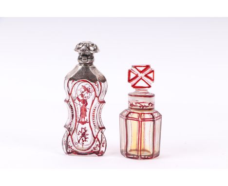 A Victorian silver mounted ruby flashed glass scent bottle of waisted form, 11cms high; together with another similar of octa