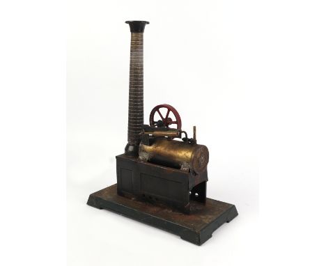A Gebruder Bing tinplate single cylinder stationary engine.