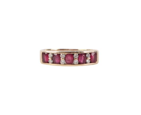 A yellow metal (tests as gold) and ruby ring, approx UK size P, 4g.