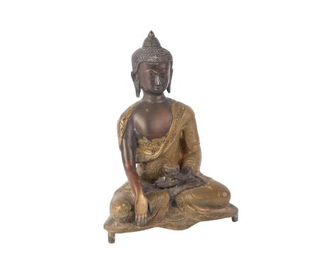A Sino-Tibetan gilt bronze seated Buddha figure, 21cms high.Condition ReportGood condition with no damage or repair