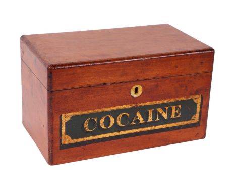 A Victorian satinwood box, the front decorated with gilt lettering 'Cocaine', 26cms wide.Condition ReportThere is general wea
