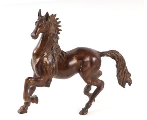 A cast bronze model of a horse, 30cms high.