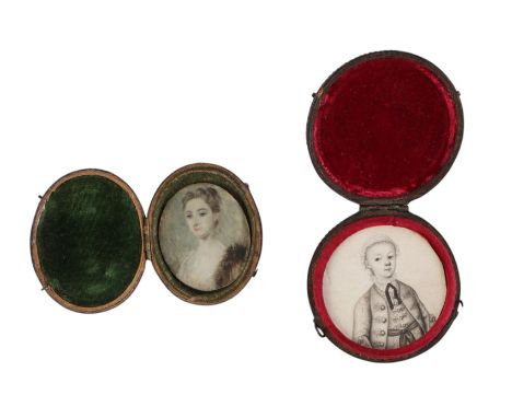 A mid 18th century ink portrait miniature depicting a young man, in a studded ray skin case, 6cms diameter; together with a 1