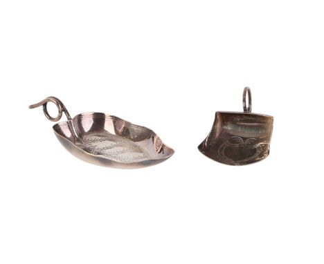 Two Georgian silver caddy spoons, one leaf shaped, the other shovel shaped (2).Condition ReportThe leaf shaped spoon has a sp