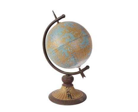 A tinplate world globe, 40cms high.