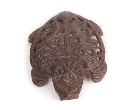 A Chinese jade / hardstone pendant in the form of a stylised turtle, 8cms long.