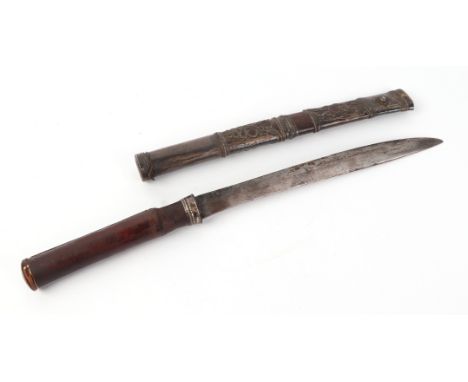 A Burmese Dha / short sword in a white metal mounted wooden scabbard leather handle, overall 45cms long, blade length 26cms.