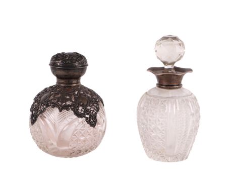 An Edwardian silver mounted cut glass scent bottle of globular form, Birmingham 1904, 12cms high; together with an Edwardian 