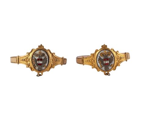 A pair of antique Austrian enamel and gilt metal bangles with Royal Cipher and initialled 'MT', possibly for Maria Theresa, Q