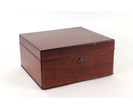 An early 20th century walnut humidor with push button release lock and key, containing a quantity of Corona cigars, 23cms wid
