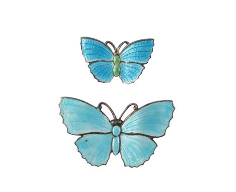 A vintage sterling silver and enamel butterfly brooch, 4cms wide; together with a similar smaller, 2.5cms wide (2).
