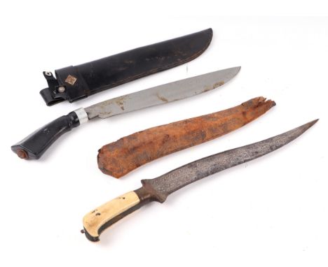 An Indo-Persian dagger with engraved steel blade and bone handle, in leather scabbard, 46cms long; together with a Parang in 