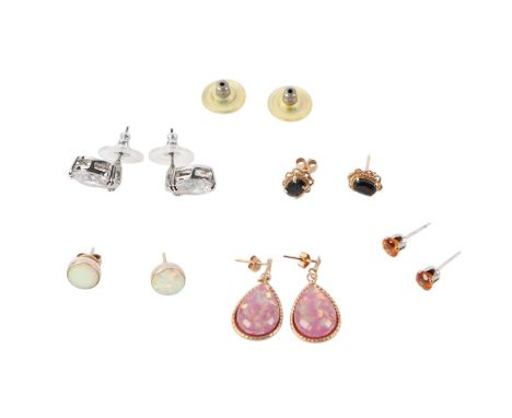 A pair of white metal mounted opal stud earrings; together with a pair of yellow metal mounted sapphire stud earrings; and ot