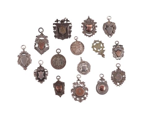 A large quantity of silver pocket watch fobs, some with gold mounts, various dates and makers marks, 280g.