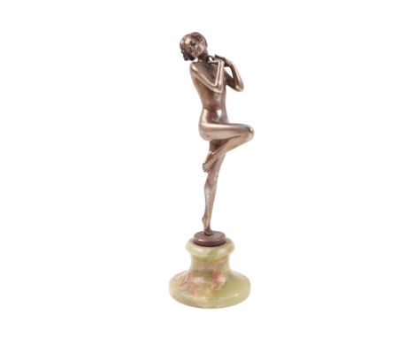 Josef Lorenzl (1892-1950) - an Art Deco bronze figure depicting a dancing lady, raised on an onyx plinth, signed Lorenzl to t