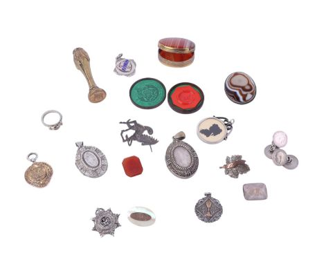 An agate mounted box; together with a silver pendant locket; silver fobs; pendants, brooches and other items.