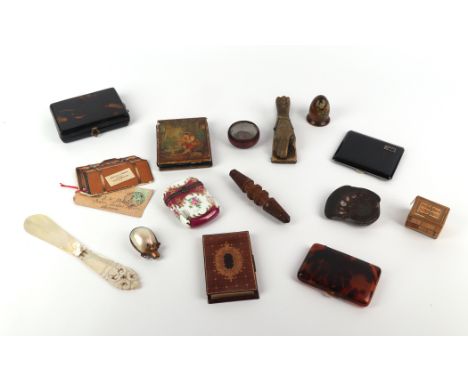 An Art Deco enamel cigarette case; together with a faux tortoiseshell cigarette case; a brass hand form letter clip; a Black 