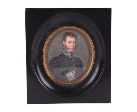 A 19th century portrait miniature on ivory depicting a continental gentleman, possibly a military officer, signed 'J Metsi' l