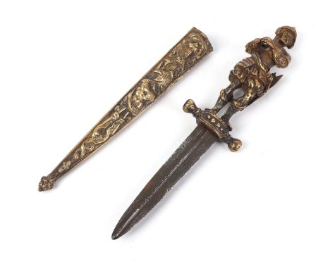 A 19th century gilt bronze romantic dagger, the handle in the form of a knight, the scabbard decorated with lion mask and arm