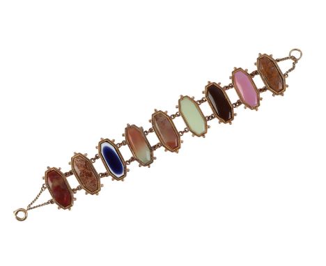 A yellow metal mounted Grand Tour hardstone panel bracelet, 18cms long.