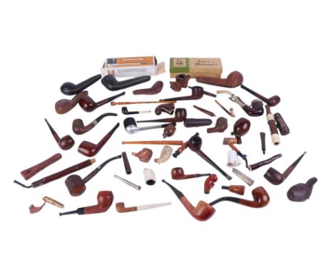 A large quantity of brier wood and similar pipes and cigarette holders; together with a quantity of empty pipe cases.