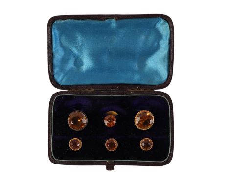 An antique boxed dress button set, Citrine mounted in yellow metal (tests as 14ct or higher).Condition ReportOne of the large