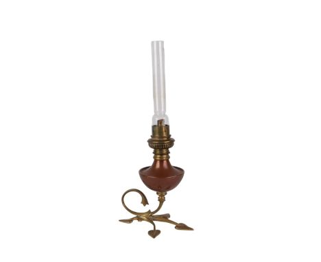 A WAS Benson brass and copper oil lamp on a naturalistic leaf base, marked and numbered 543 to the underside, 37.5cms high in