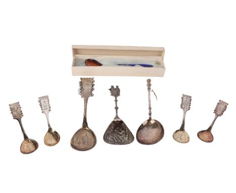Five Swedish silver spoons engraved with figures and reindeer,; together with a continental sterling silver and guilloche ena